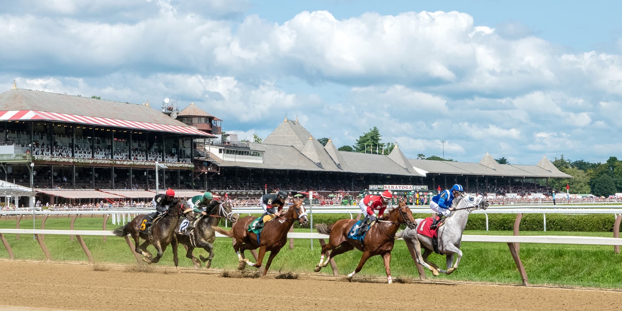 Horses running at Saratoga Springs Race Course