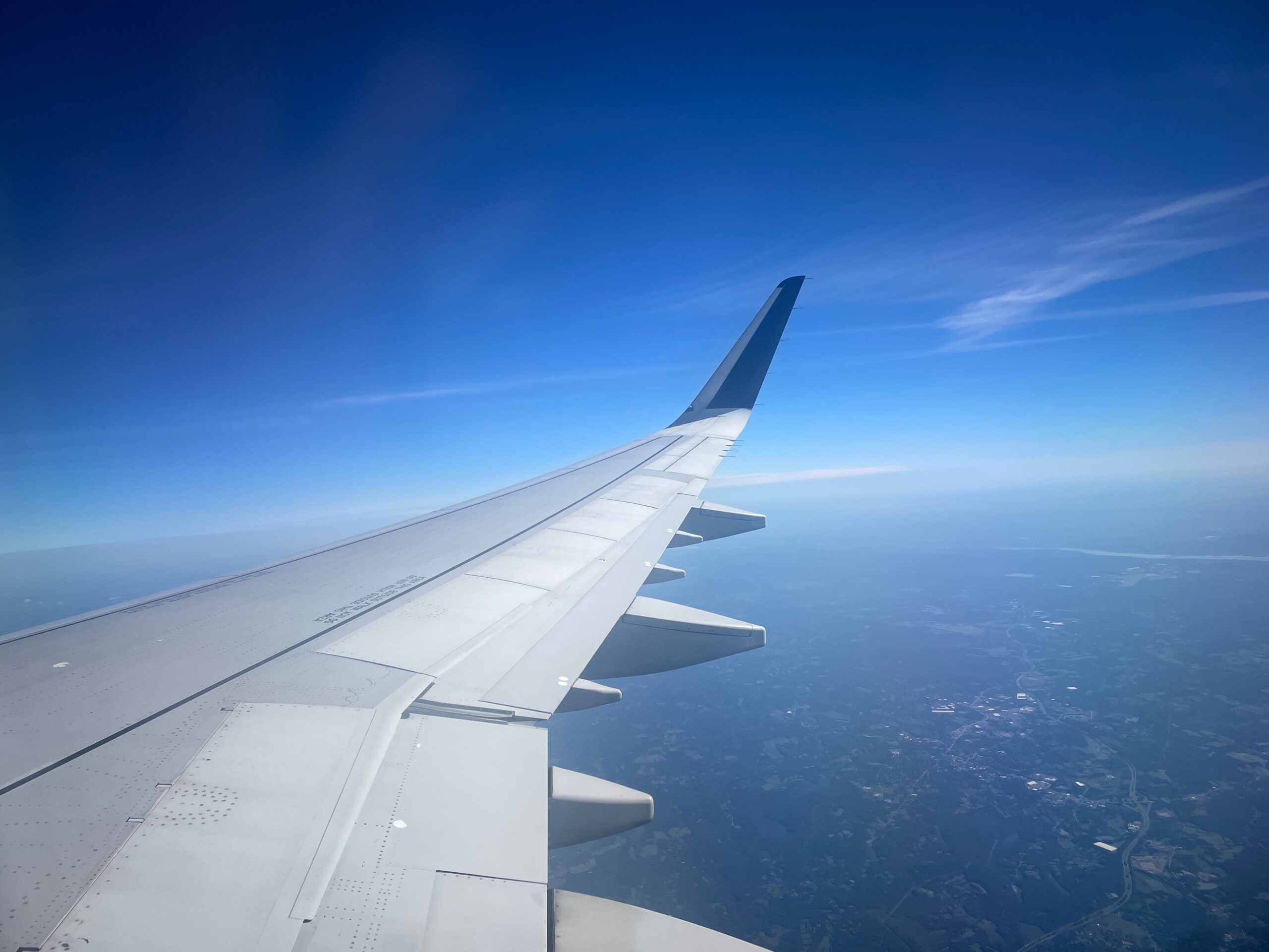 Looking out over the wing of an airplane mid-flight